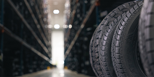 Stacks of tires in a warehouse