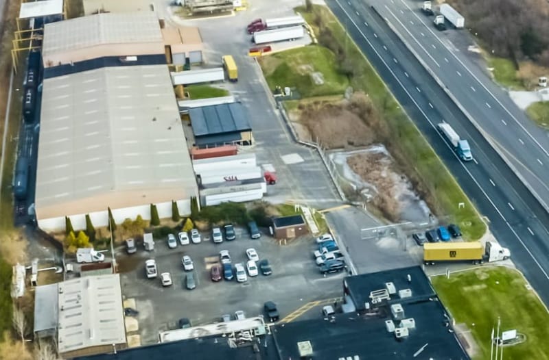 Aerial view of facility and highway