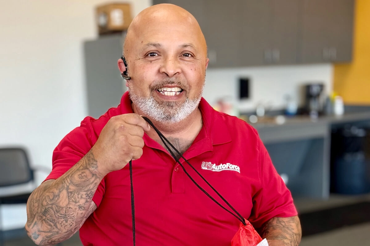 Customer service team member representing U.S. AutoForce with headset