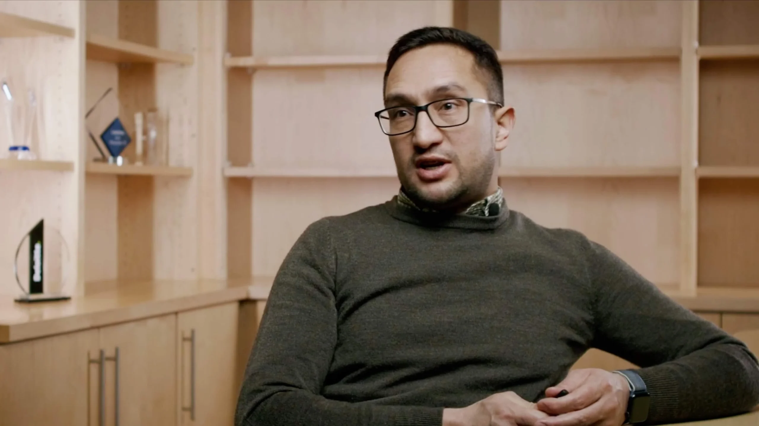 Employee sharing company story during corporate video interview