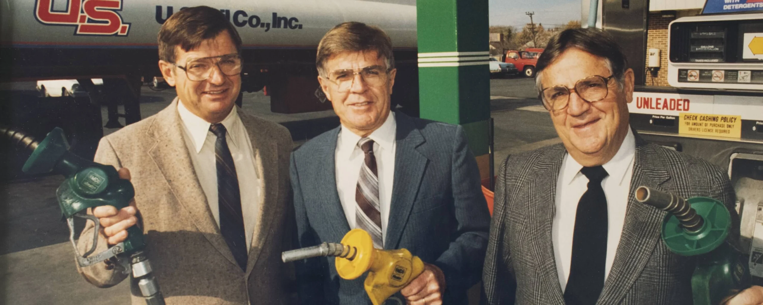 Historic U.S. Venture image showing early leadership and gas pumps